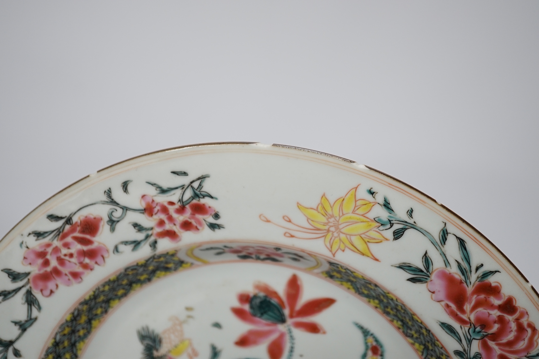 Two Chinese famille rose porcelain plates, mid 18th century, largest 23cm diameter